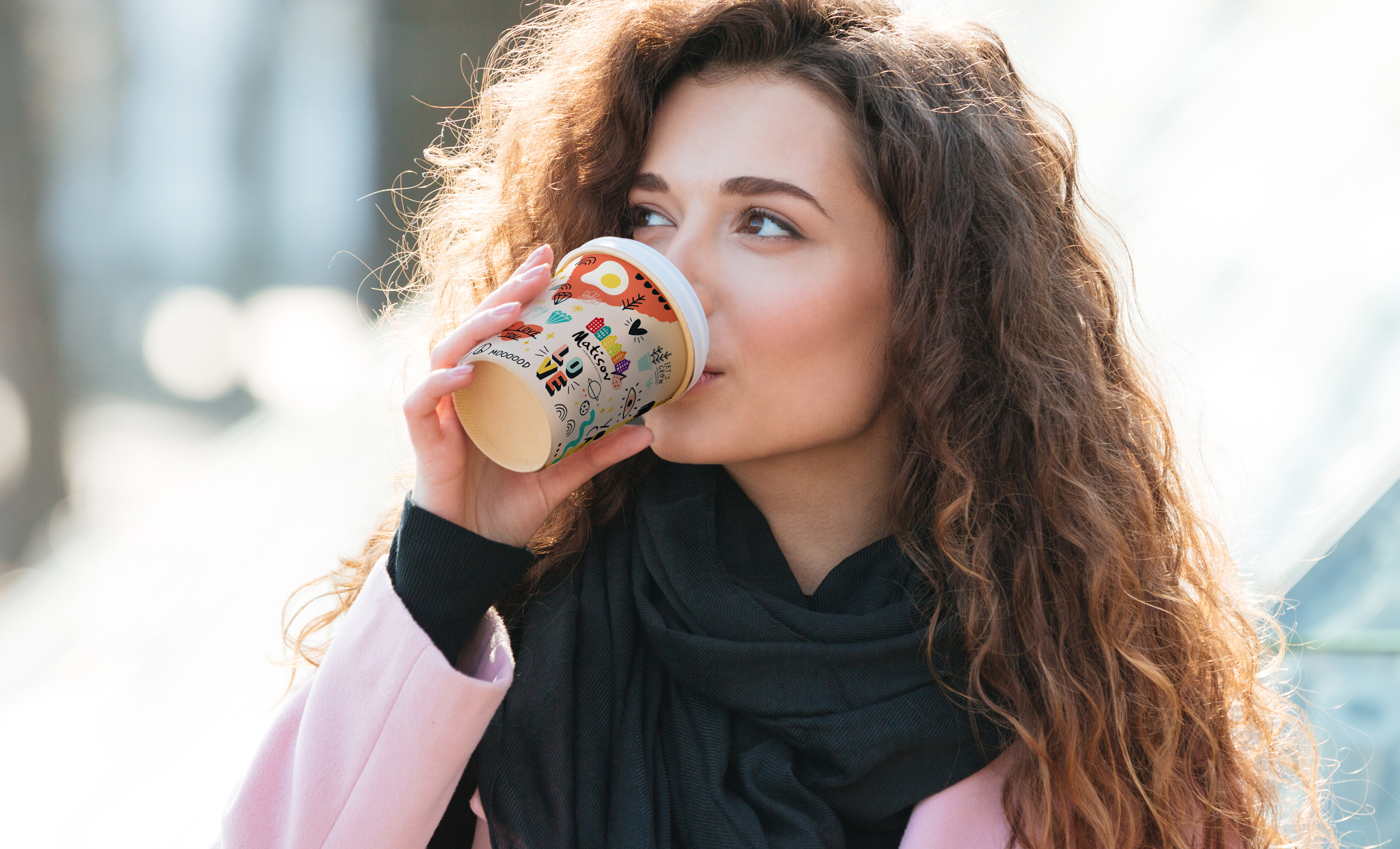 cute-young-woman-drinking-take-away-coffee-P8DCKCцG.jpg