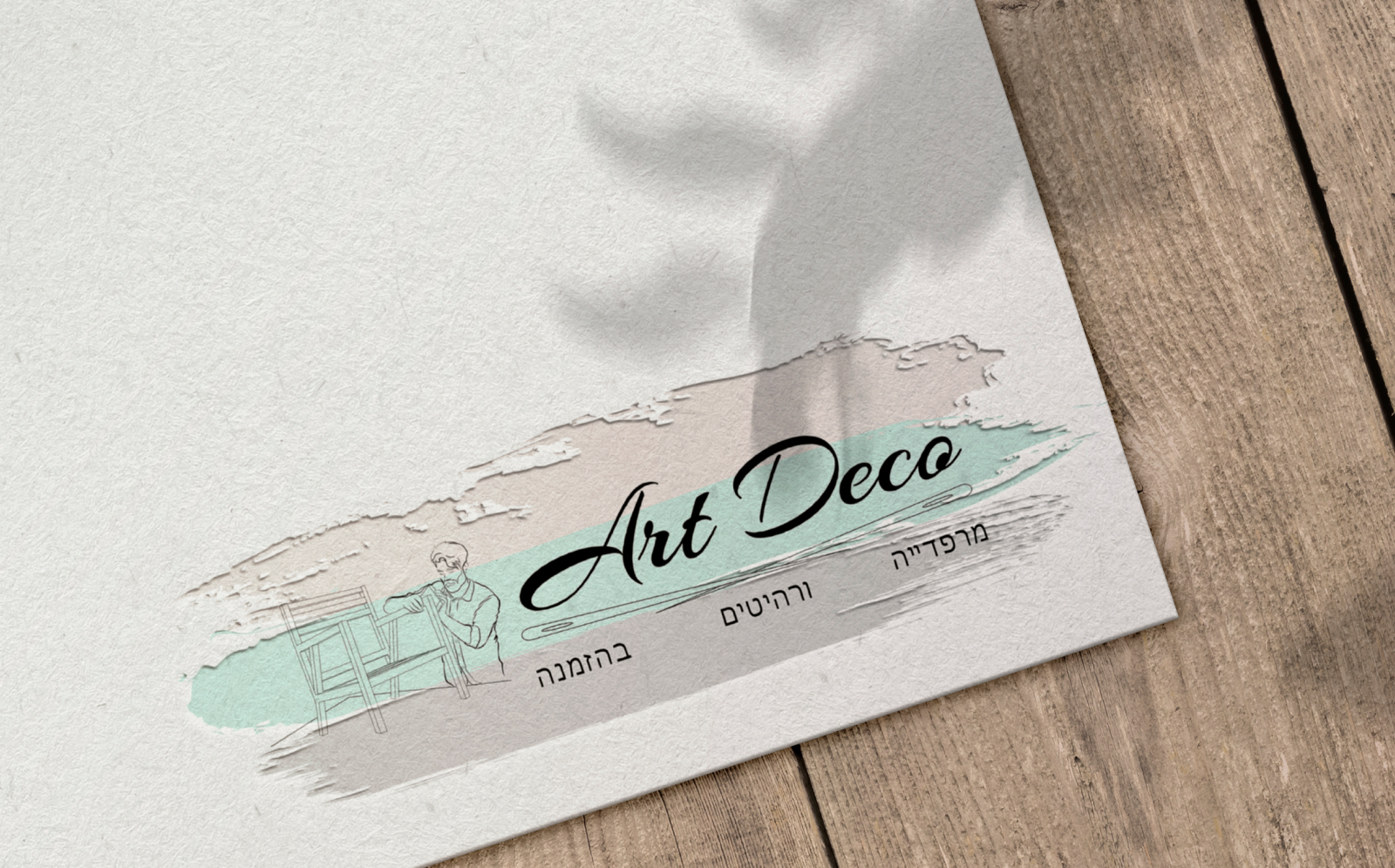 Engraved_logo_on_paper_mockup 1.jpg