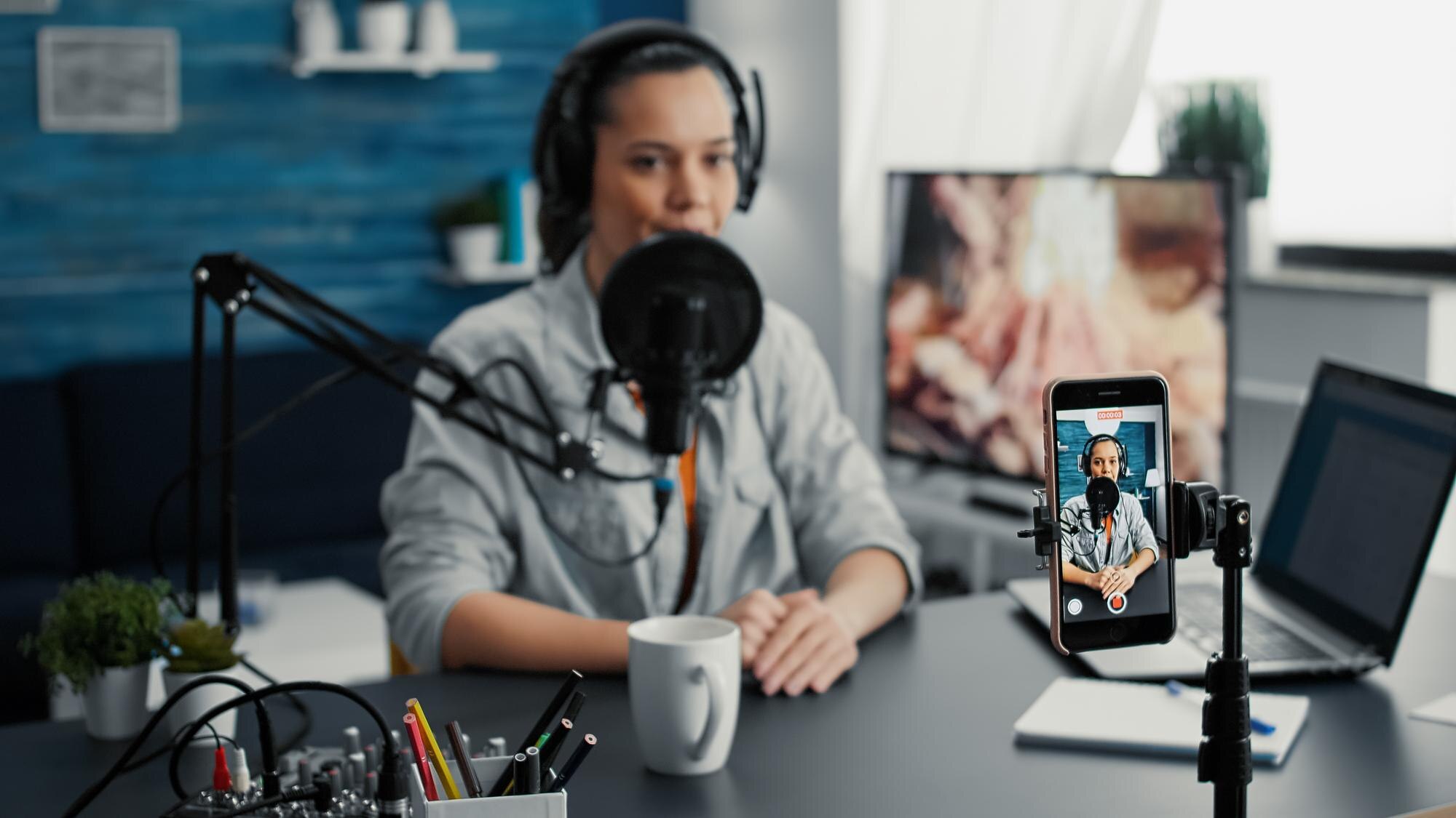 social-media-influencer-using-modern-laptop-while-streaming-remo