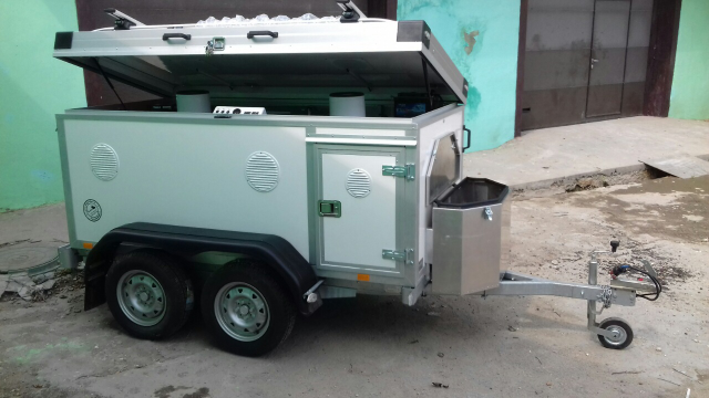 Прицеп для перевозки собак.