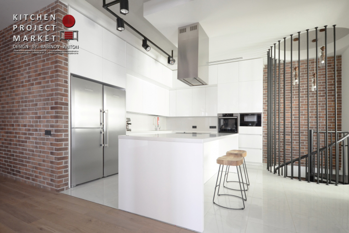 Белая островная кухня в интерьере загородного дома