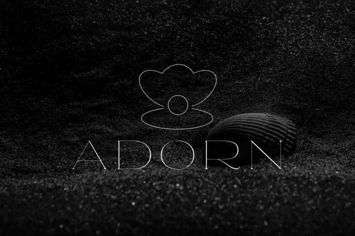 "Adorn: Логотип для Изысканных Ювелирных Украшений из Жемчуга"