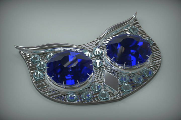 Золотая брошь с камнями