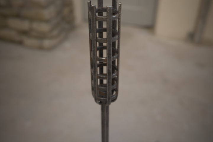 Металлический средневековый подсвечник