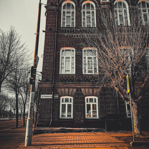 город