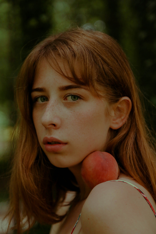 girl with peach