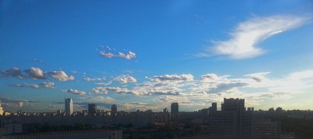 Город