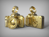 Фотокамера Canon. Золотой кулон с бриллиантами