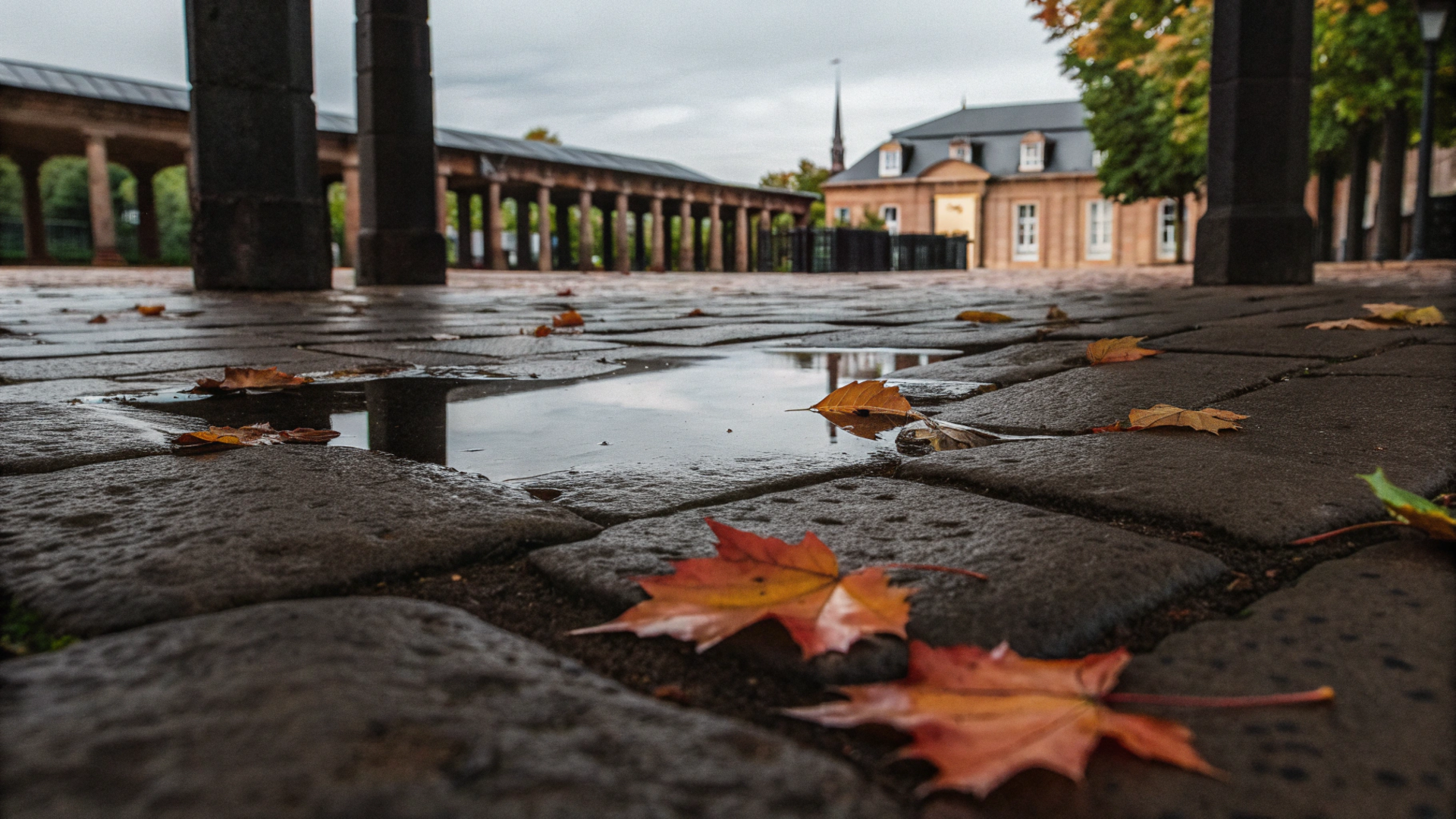 the-old-town-square-is-covered-in-puddles-and-stre.png