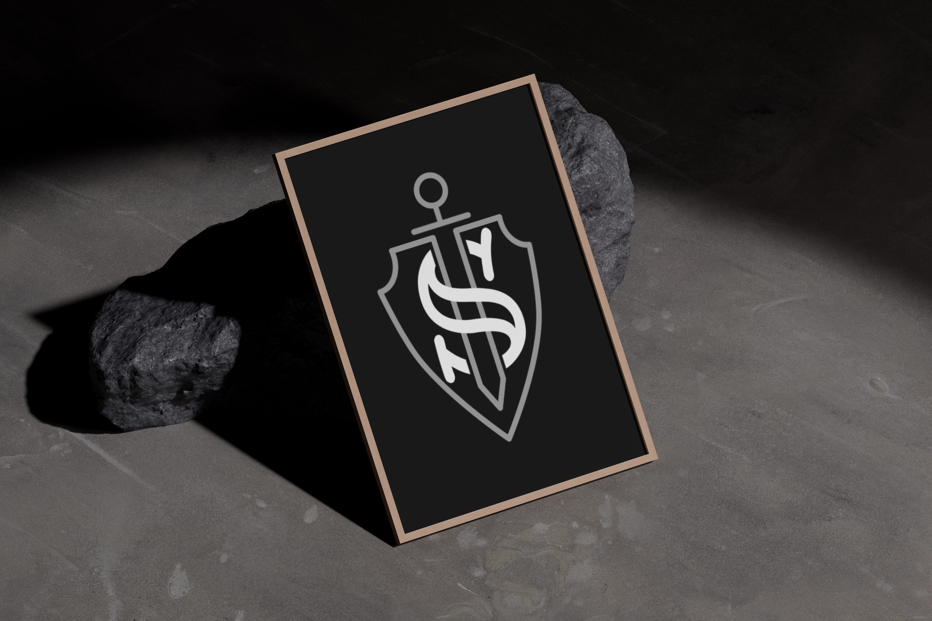 Mockuuups A3 poster mockup on a concrete floor with rocks.jpeg