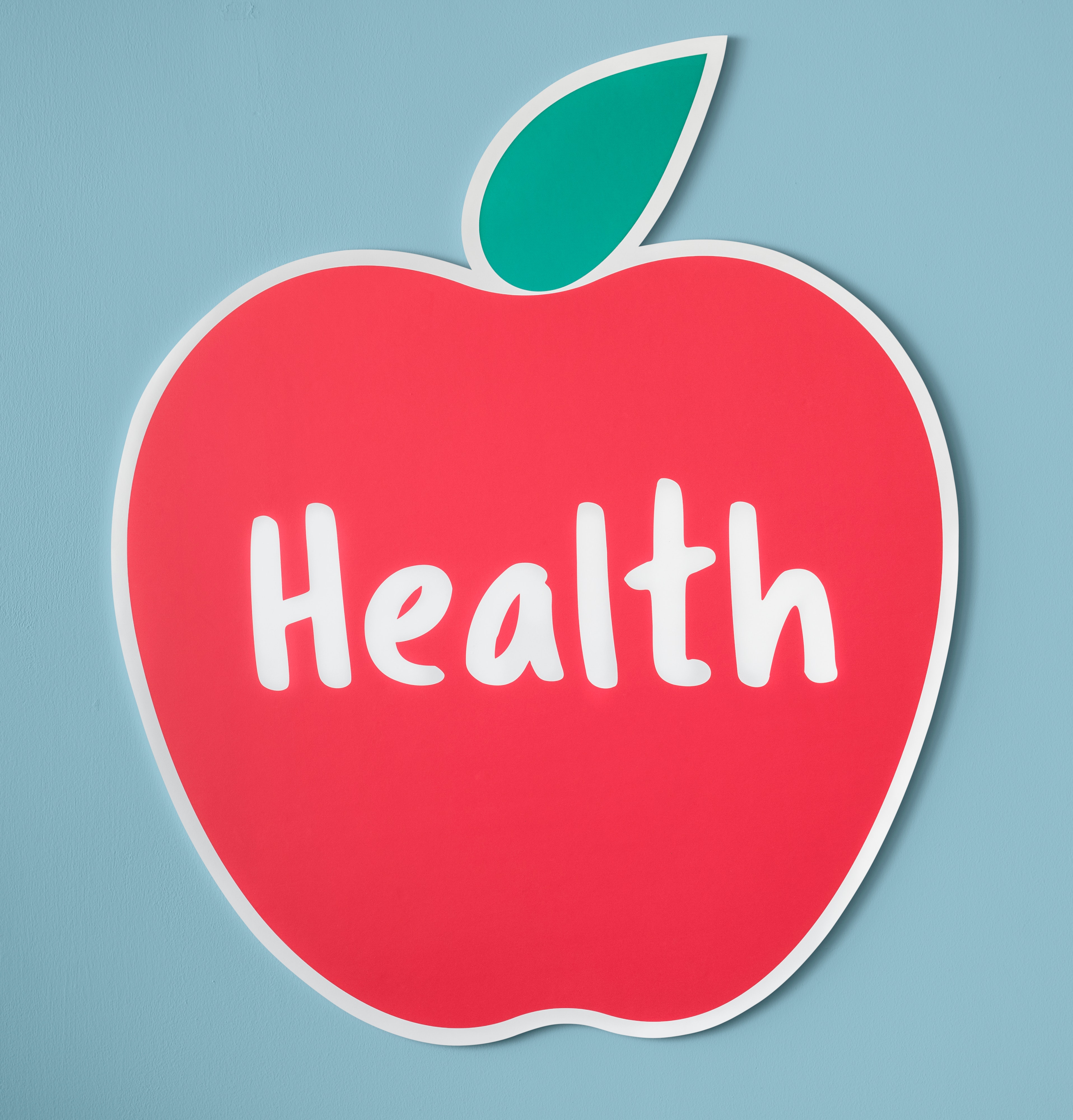 apple_blue_background_close_up_1353366.jpg