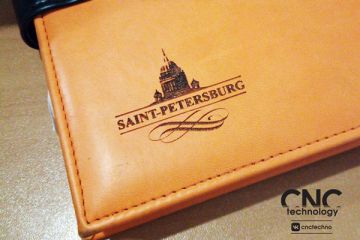 Лазерная гравировка: нанесение эмблемы на ежедневники, кожу, картон