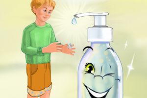 the boy disinfects his hands
