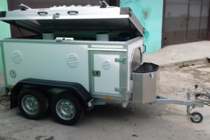 Прицеп для перевозки собак.