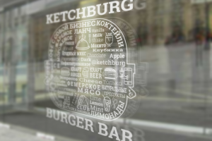 Рекламная наклейка на окно.