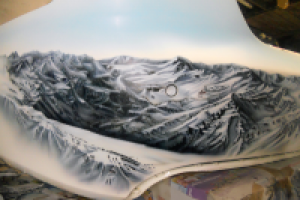 Аэрография на бампере А4. Горы. Сноуборд. Без лака.