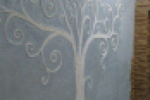 гипсовый барельеф на стене