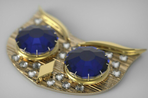 Золотая брошь с камнями