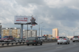 Баннер наружной рекламы The MID вид с автострады