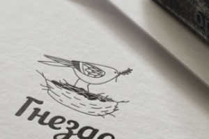 Логотип для магазина ручных изделий "Гнездо"