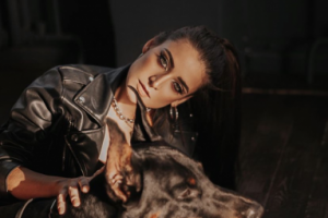 С доберманом