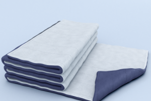 Прошитое двухстороннее одеяло для утепления.