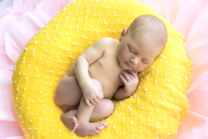 На подушечке