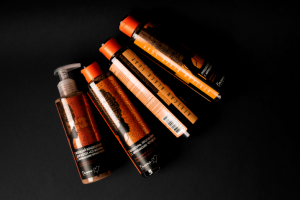 Этикетка для серии косметики для волос на основе черного мыла