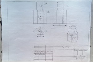 Деталь в 3-х проекциях + аксонометрия.