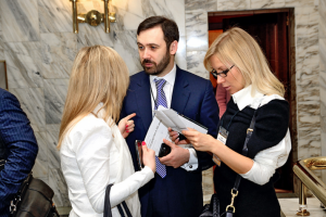 На конференции.