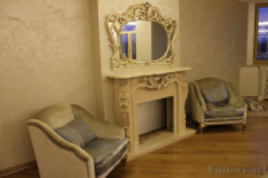 Декорирование камина серебряной поталью.