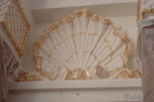 Золочение лепнины поталью.