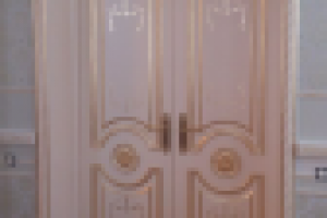 Позолота дверей поталью.