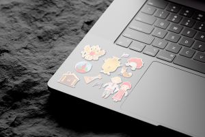 03-Laptop-Sticker-On-Rock-Mockup