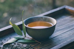 a-rustic-wooden-tray-holds-a-simple--elegant-cup-o-2