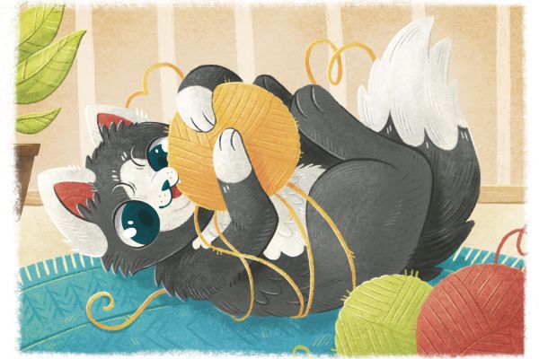 Кот играет с клубком