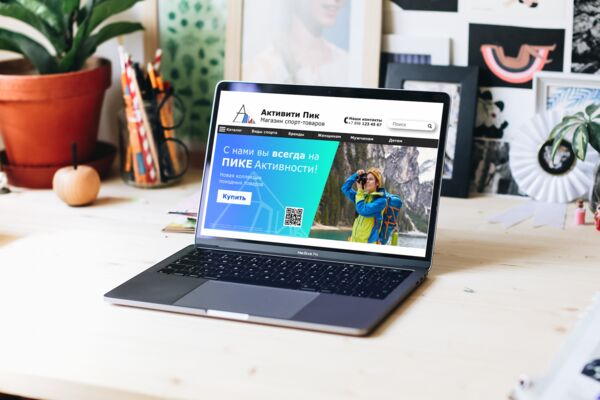 Wide view mockup of the creative workspace with Macbook Pro (Moc