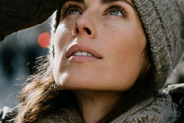 Assel_Jantemirova_a_woman_standing_on_a_city_street_looking_u_e5135a56_5023_4a0a_a11c_2bb5e07a094c_1.png