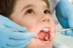 Статья со стоматол. сайта о лечении детских зубов (RUS-EN)