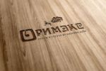 Логотип фирмы "Оримэкс" по изготовлению мебели из дуба